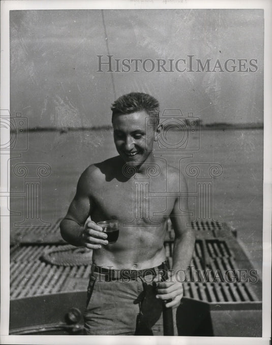 1953 Press Photo Red River Sailor Drinking Red Wine on French Navy Ship