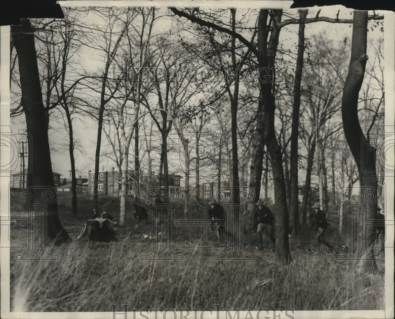 Load image into Gallery viewer, 1930 Press Photo Cadets advancing thru the woods of Pennsylvania Military School

