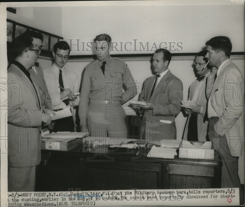 Load image into Gallery viewer, 1951 Press Photo Col.James B Lear P.I.O at Military Academy talks to reporters
