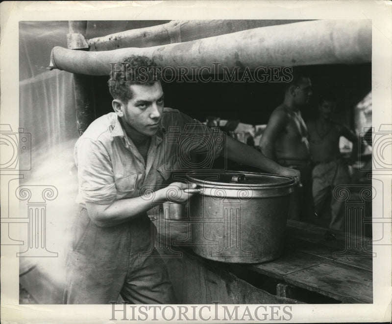 Load image into Gallery viewer, 1944 Press Photo Sam Begleiter carries soup pot in medical table-Cape Gloucester
