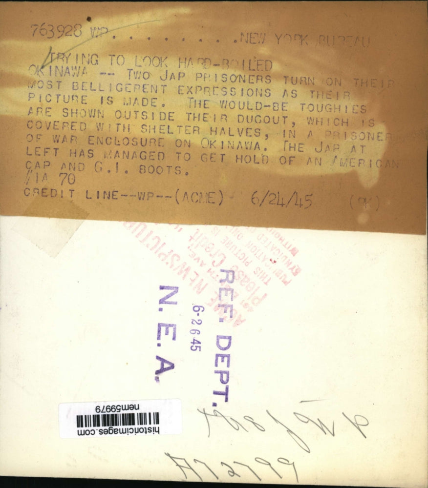 1945 Press Photo Japanese Prisoners of war show fierce faces at Okinawa Camp