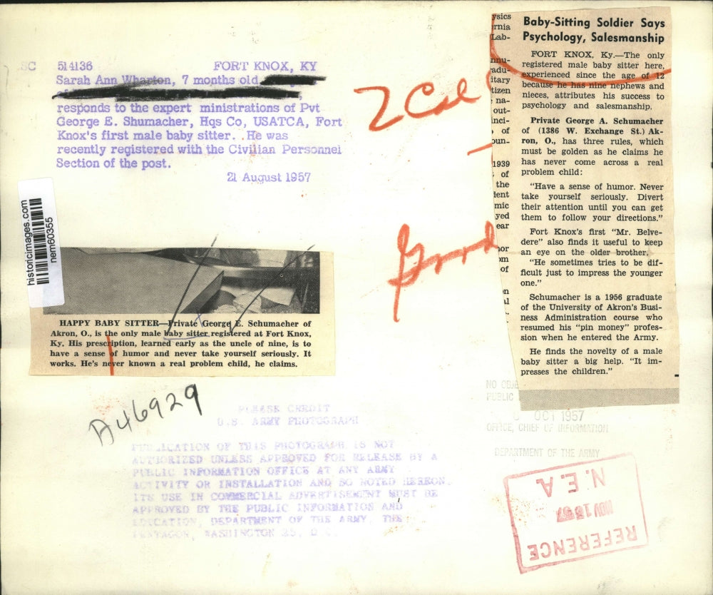 1957 Press Photo Pvt. George E. Schumacher babysitting Sarah Ann Wharton