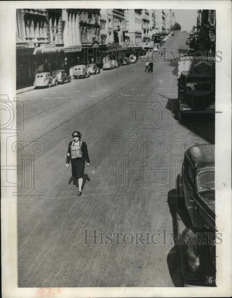 Load image into Gallery viewer, 1942 Press Photo An Air Raid Precautions Warden in a deserted Bourke Street

