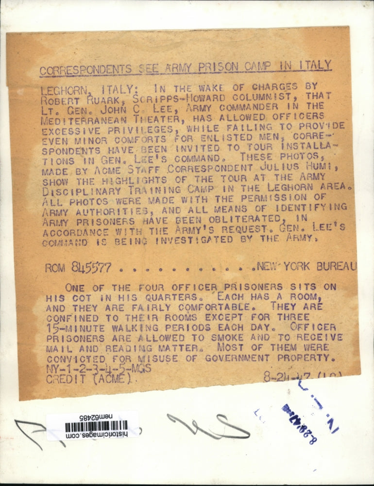 1947 Press Photo Officer prisoner sits in his room at Prison Camp in Italy