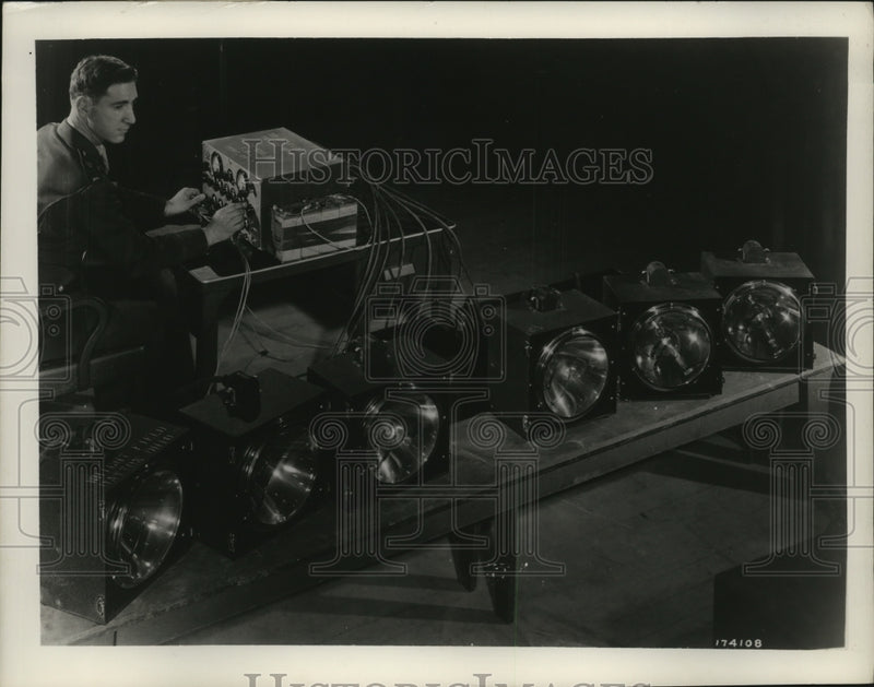 Load image into Gallery viewer, 1945 Press Photo Captain C. H. Coles at the control of the new microflash units
