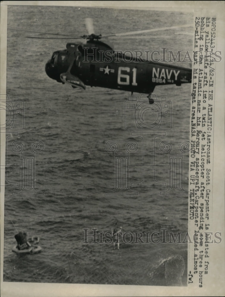 Load image into Gallery viewer, 1962 Press Photo Astronaut Scott Carpenter hoisted from Life Raft at Atlantic
