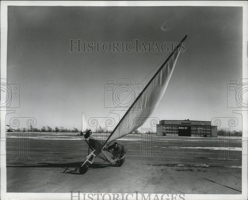Load image into Gallery viewer, 1955 Press Photo Bill Traylor, Jr. travels with sail wagon at Ford County Base
