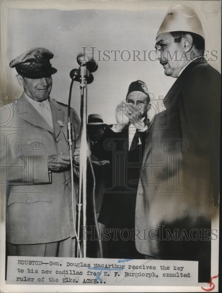 1951 Press Photo General Douglas MacArthr receives Cadillac key from the Elks