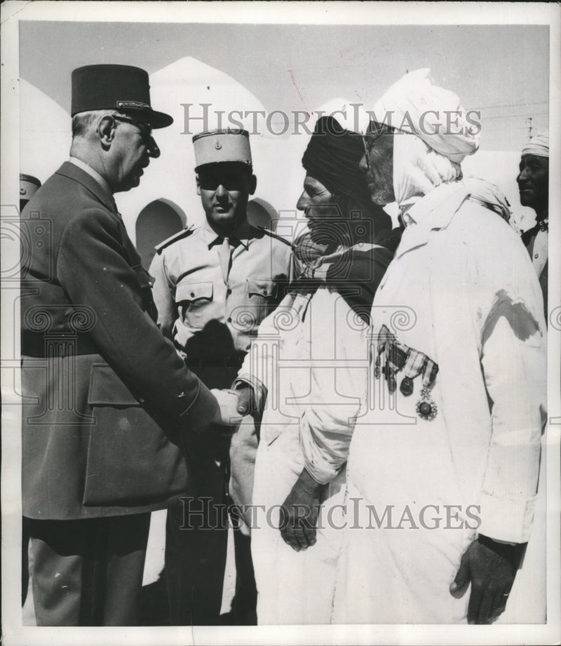 Load image into Gallery viewer, 1957 Press Photo Sahara Dignitaries welcome General Charles De Gaulle

