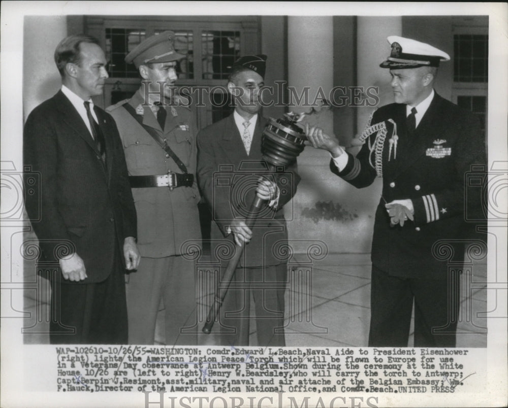 1955 Press Photo Comdr. Edward Beach lighting up the American Legion Peace Torch