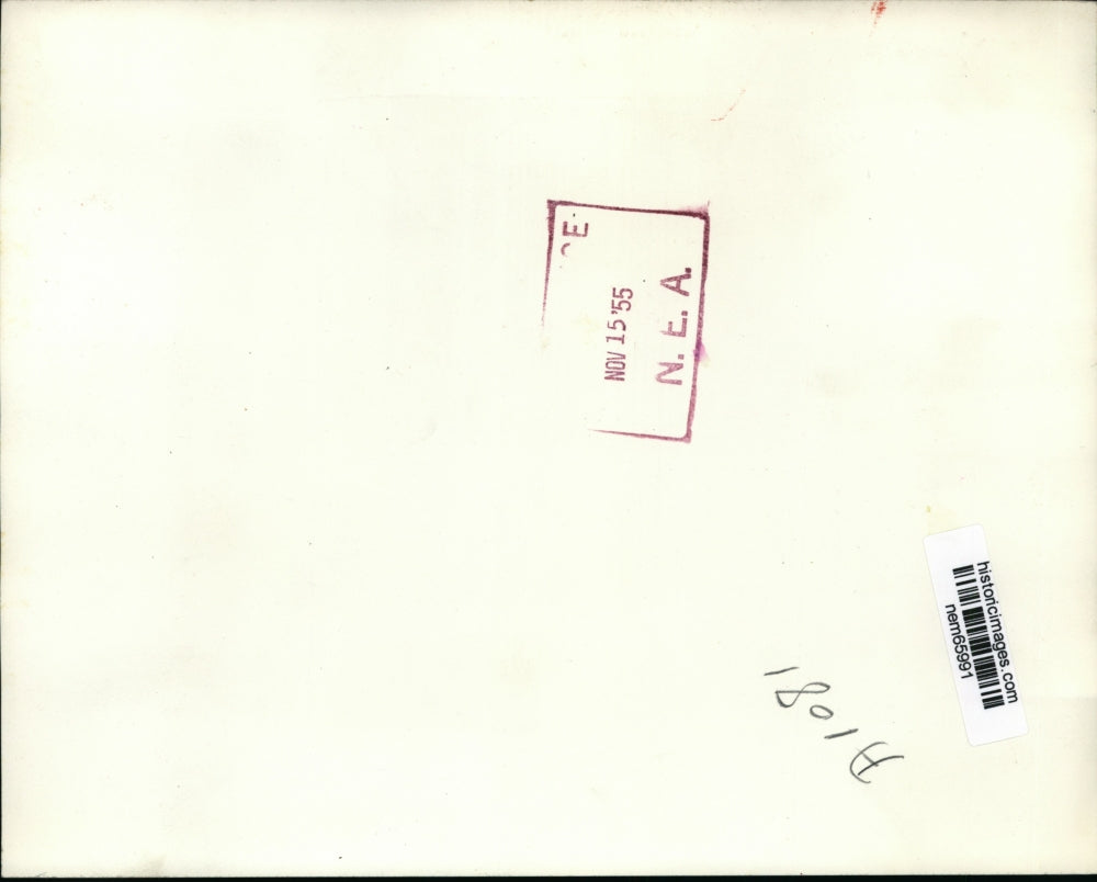 1955 Press Photo Comdr. Edward Beach lighting up the American Legion Peace Torch