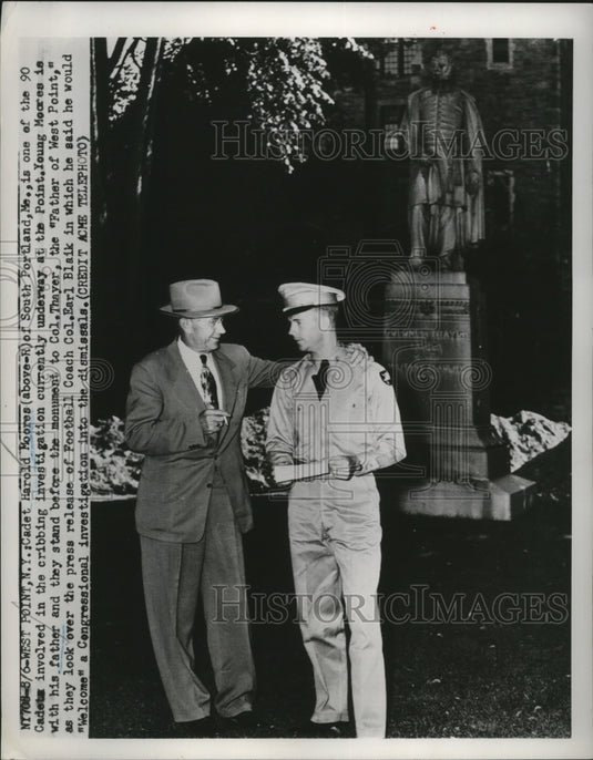 1951 Press Photo Cadet Harold Moores and his father stand before the monument