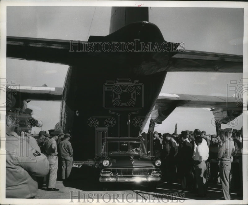 Load image into Gallery viewer, 1957 Press Photo A car emerging from cargo cavity of C-130 Lockheed Hercules
