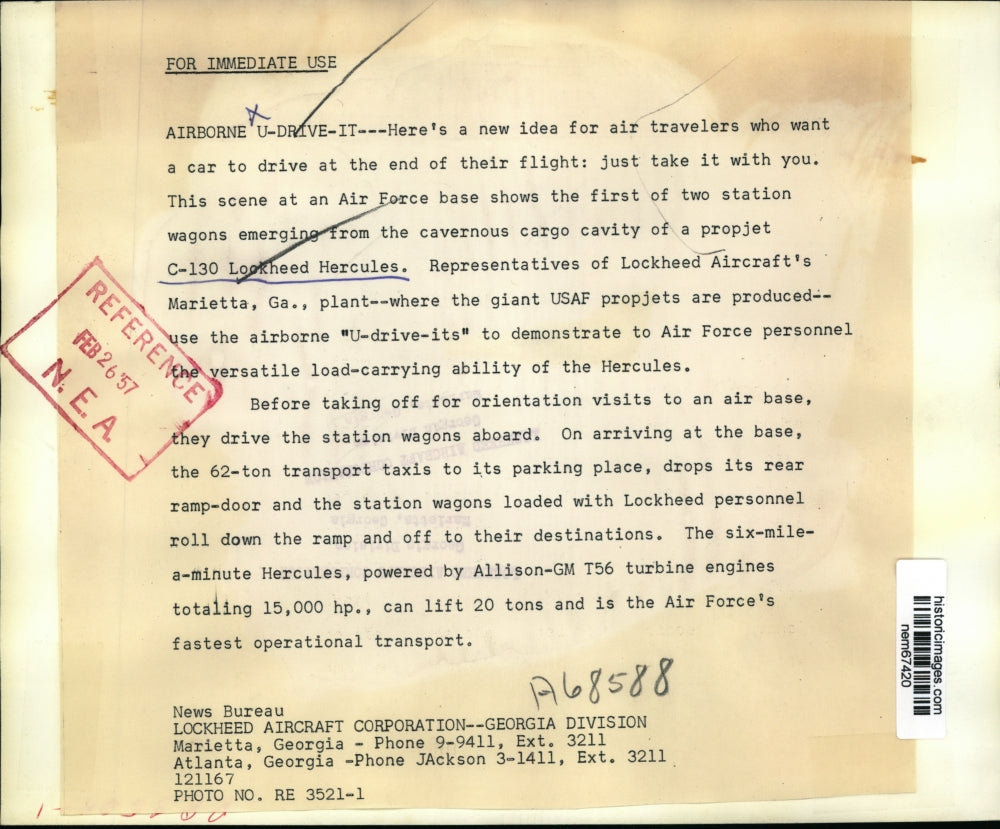 1957 Press Photo A car emerging from cargo cavity of C-130 Lockheed Hercules