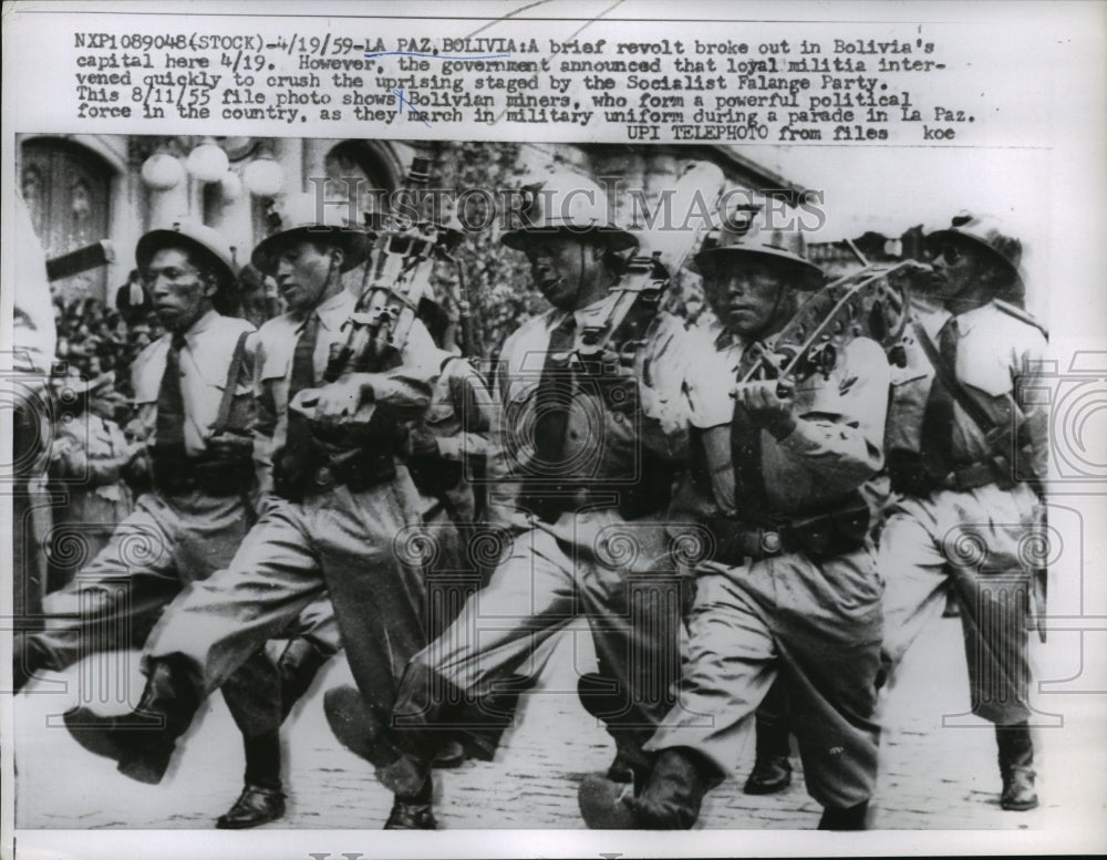 1959 Press Photo Bolivian miners dressed in military uniform during the parade