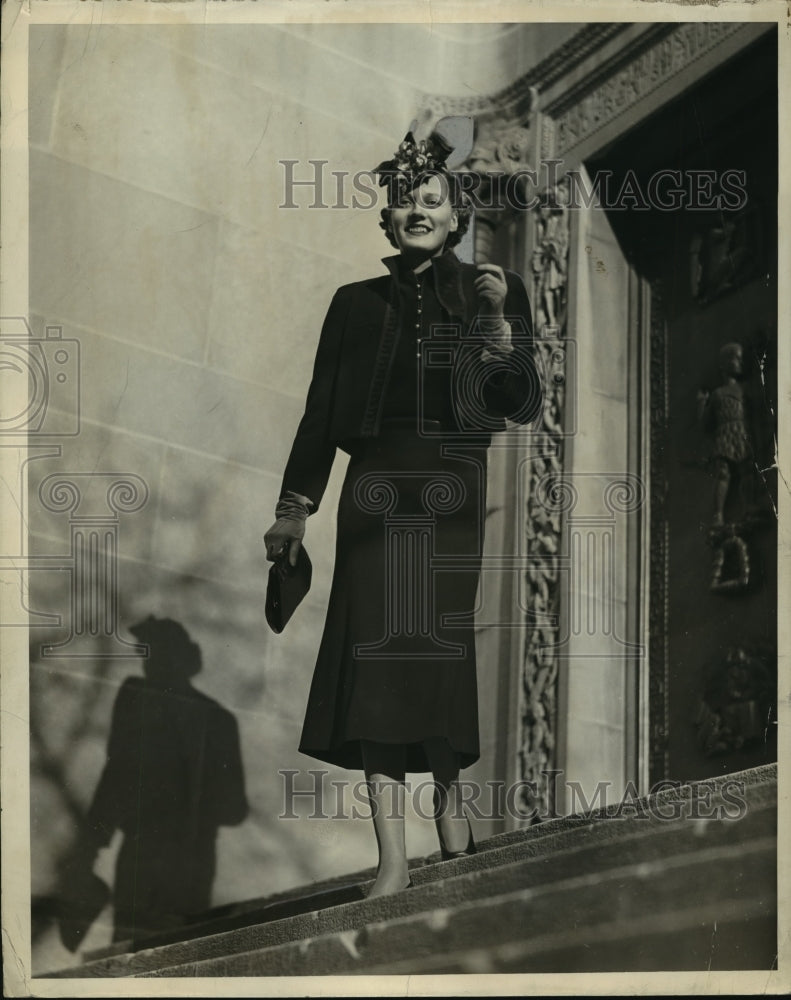 1937 Press Photo Woman wears dark dress with matching hat