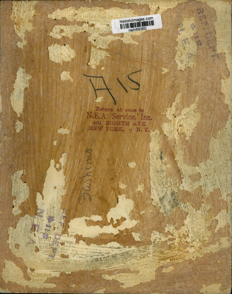 1937 Press Photo Woman wears dark dress with matching hat