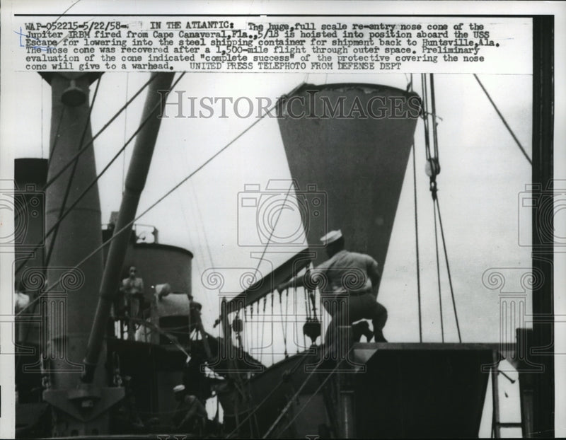 Load image into Gallery viewer, 1958 Press Photo Jupiter IRBM Nose Cone Hoisted Into Position Aboard USS Escape
