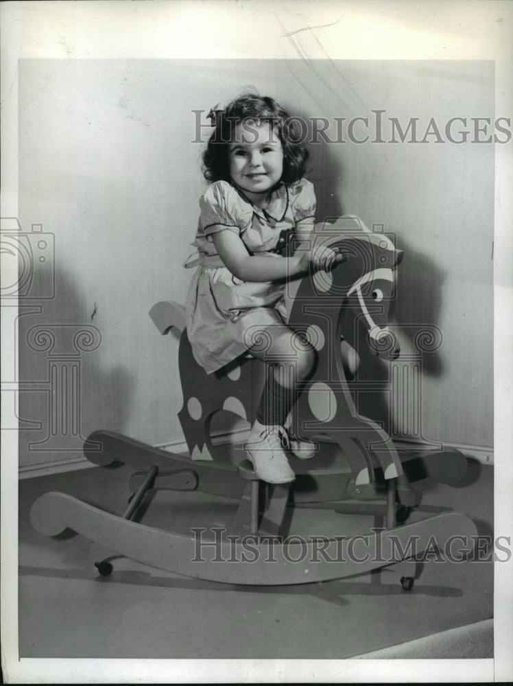 1942 Press Photo New York Rita Gruberger tests rocking horse with wheels NYC- Historic Images