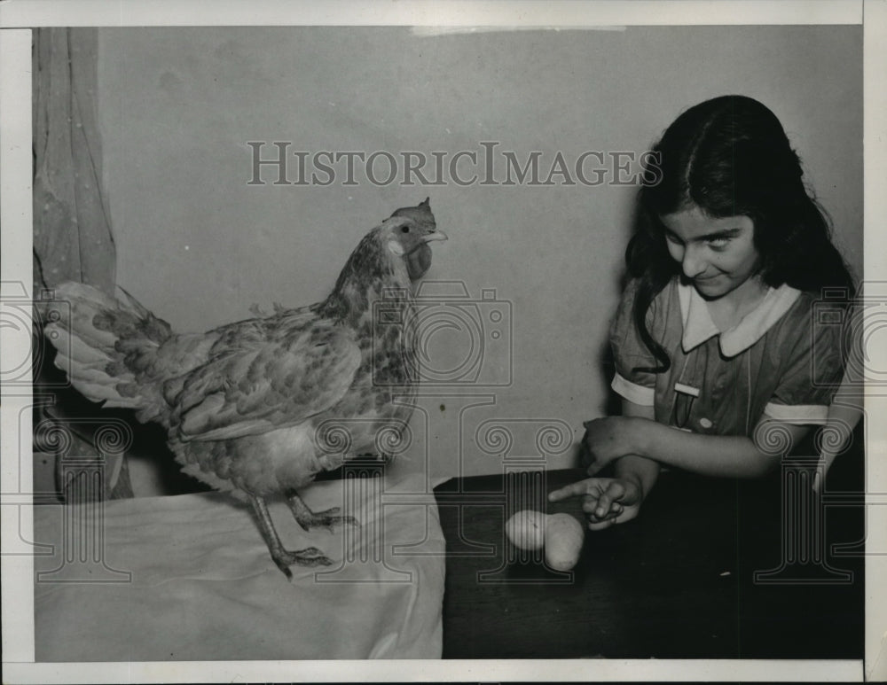 1938 Press Photo Christina Pastor visits layer of half-pound egg in Long Island- Historic Images