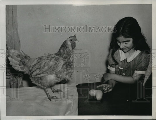 1938 Press Photo Christina Pastor visits layer of half-pound egg in Long Island- Historic Images