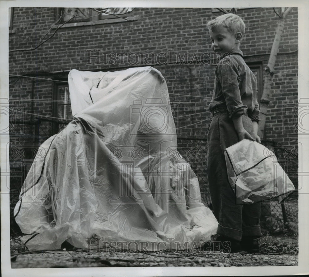 1957 Press Photo New York Richard Maurel & his bicycle covered in plastic NYC