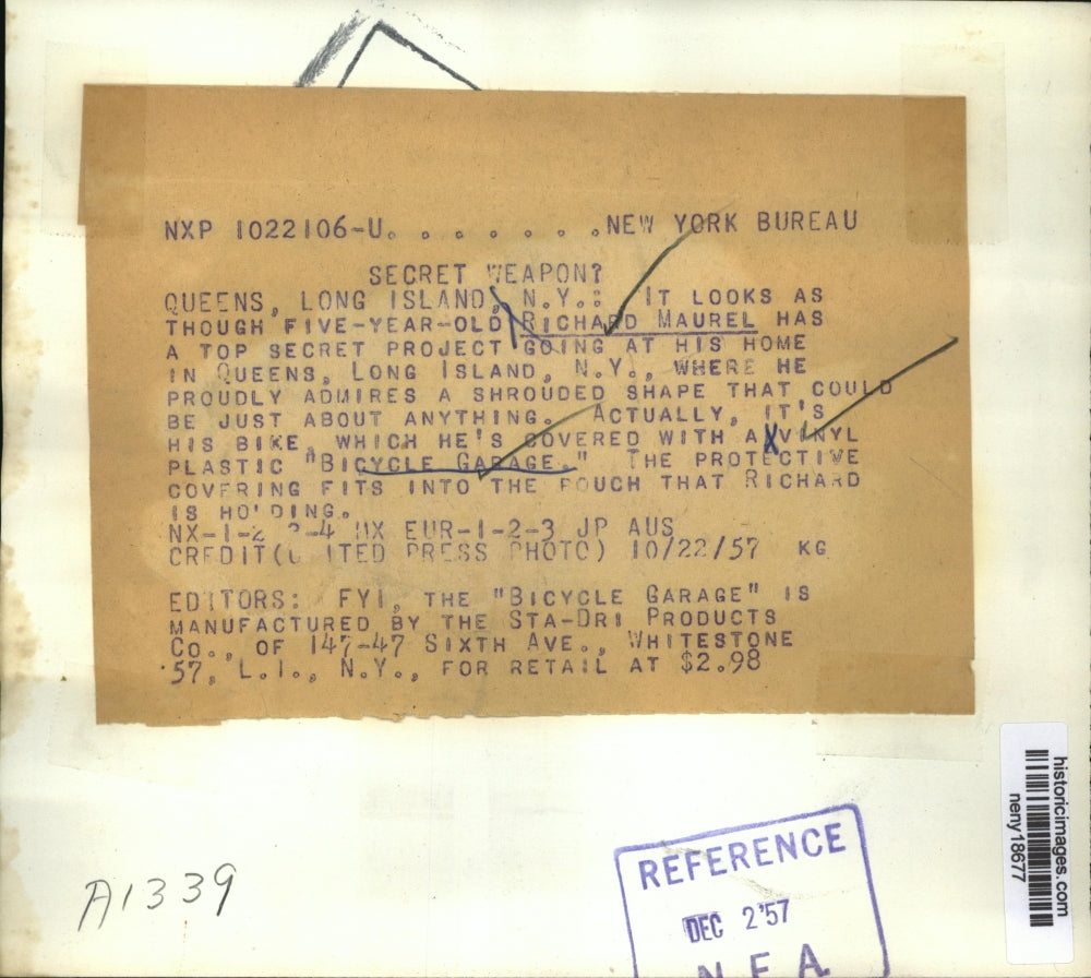 1957 Press Photo New York Richard Maurel & his bicycle covered in plastic NYC