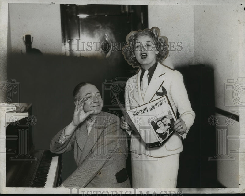 Load image into Gallery viewer, 1935 Press Photo New York Joan Abbott and Abner Scher Singing NYC - neny18812

