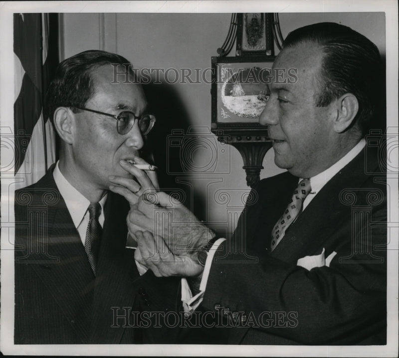 Load image into Gallery viewer, 1954 Press Photo New York Robert Wagner Lights Cigarette for Sado Iguchi NYC
