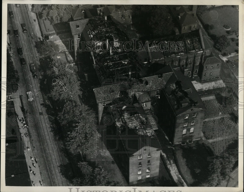Load image into Gallery viewer, 1931 Press Photo Aerial view of fire damaged to Pittsburgh PA home for aged
