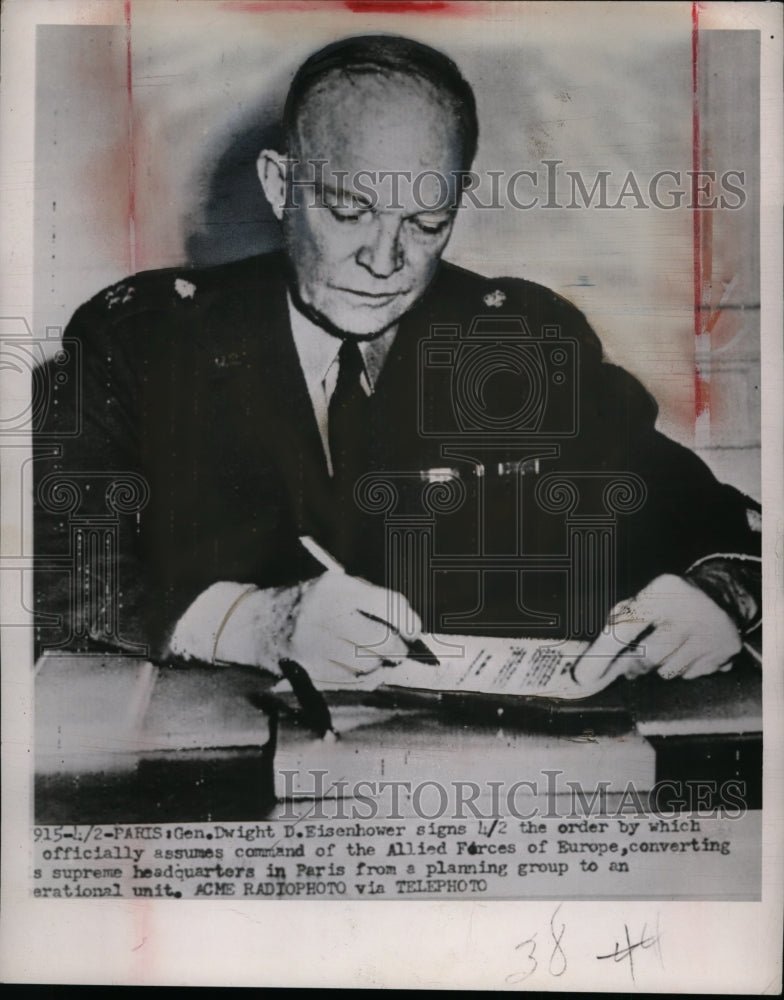Load image into Gallery viewer, 1951 Press Photo Dwight D. Eisenhower Signing Allied Europe Command Order, Paris
