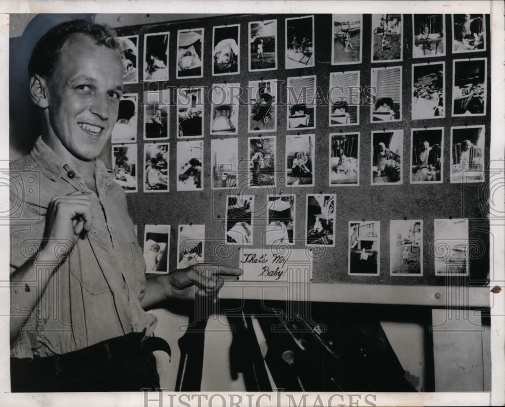 1944 Press Photo John E. Olson with Photos of Baby Son During World War II