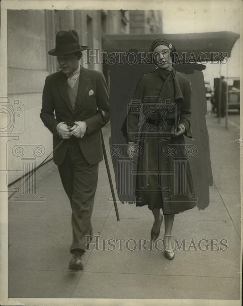 Load image into Gallery viewer, 1930 Press Photo Baron Herwarth &amp; Mrs. Geoffrey Mc N Gates stroll Park Ave. NYC

