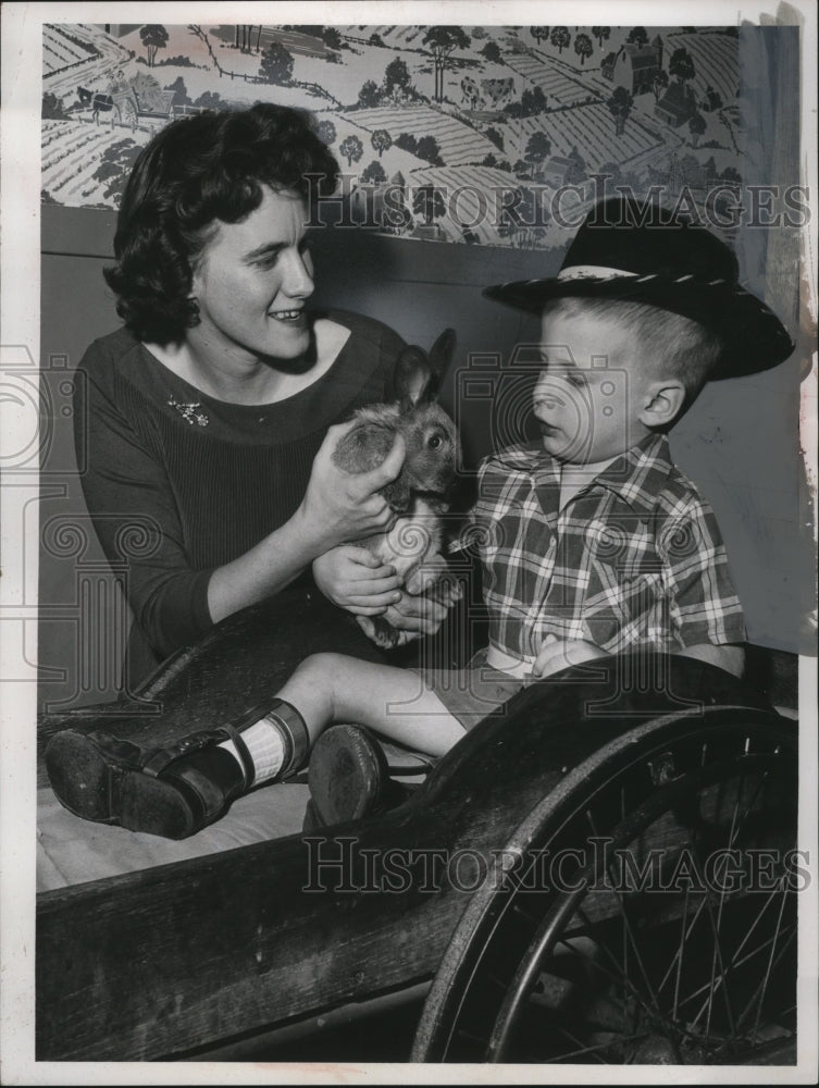 Load image into Gallery viewer, 1960 Press Photo Mrs. Frank Wilde &amp; Son Mark with Rabbit - neo06453
