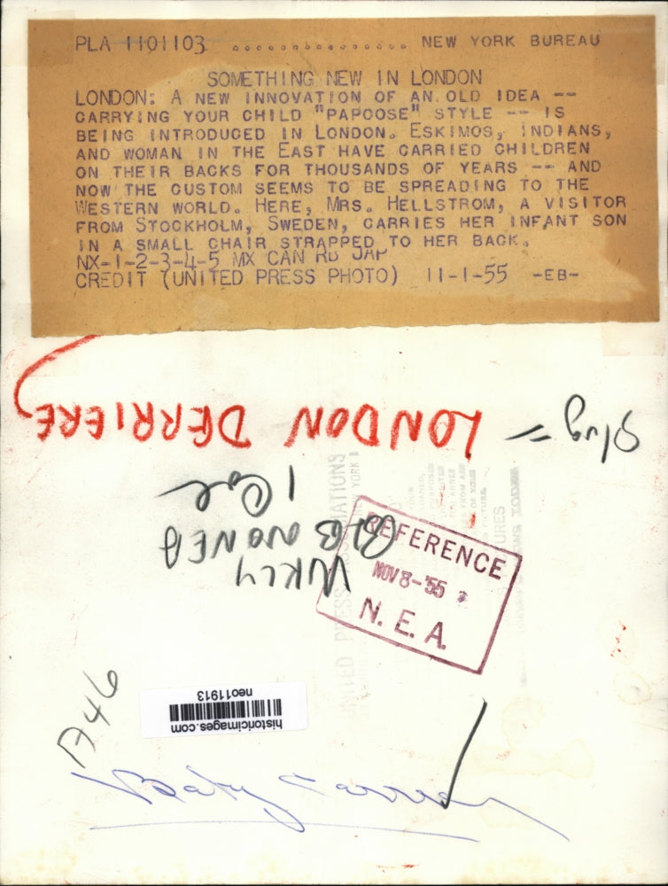 1955 Press Photo Woman with Back Baby Carrier, London - neo11913