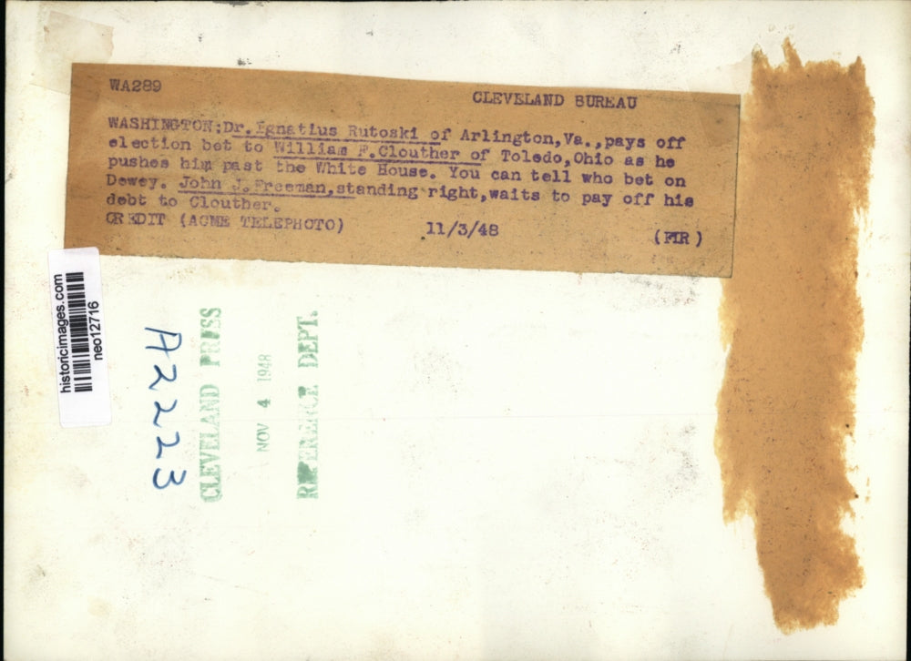 1948 Press Photo Dr Ignatius Rutoski Pays off Election Bet to William Clouther