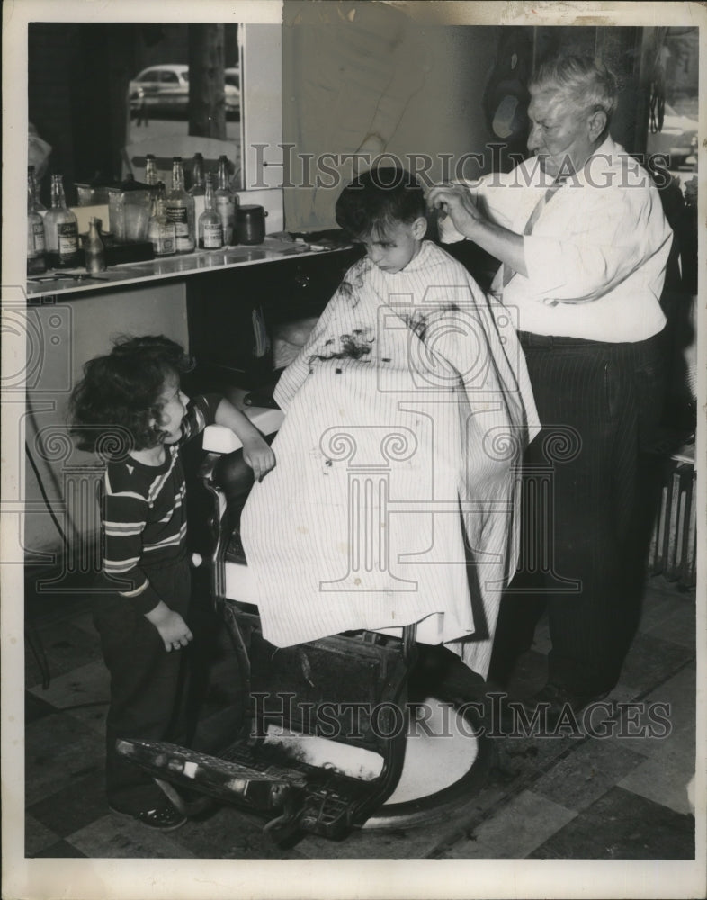 Load image into Gallery viewer, 1951 Press Photo James &amp; Joel viisit barber Frank Pietrafisi - neo13228
