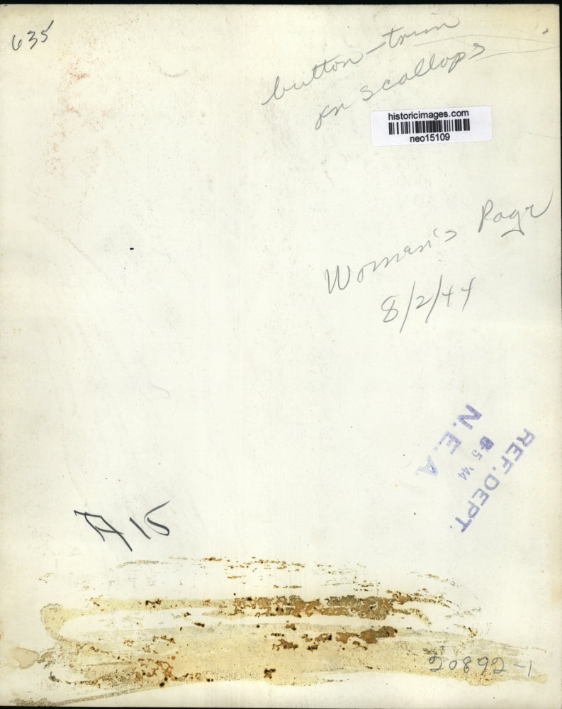 1944 Press Photo Button down on scalloped front jacket in Womens Fashions