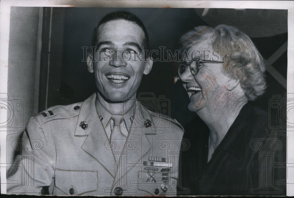 1955 Press Photo Myrtle Power & Marine Capt. Richard McCutcheon after game show
