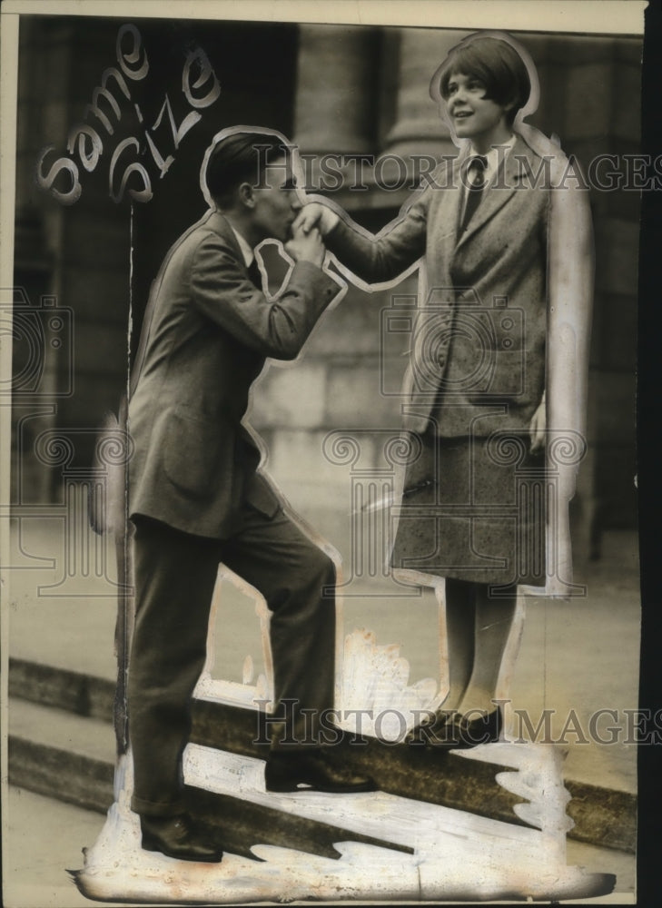 Load image into Gallery viewer, 1925 Press Photo Flapper Elizabeth Lacey &amp; Bob Miller Demonstrating Hand Kiss
