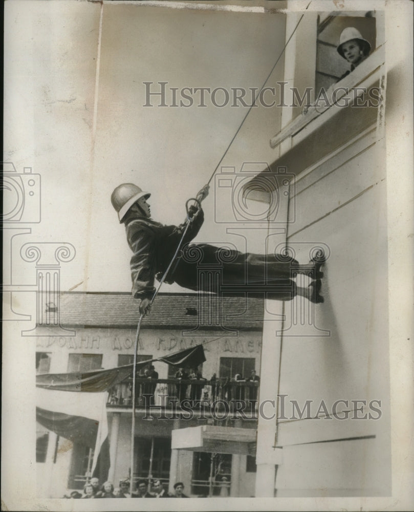 1939 Press Photo Lady Firefighter of Yugoslavia Trains for National Emergencies