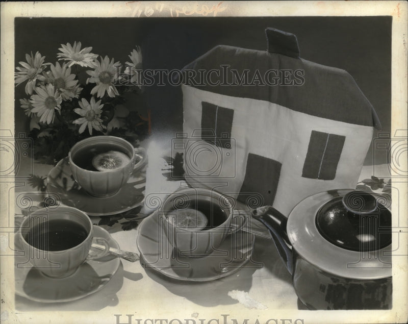 Load image into Gallery viewer, 1946 Press Photo Tea Set on Table - neo19674
