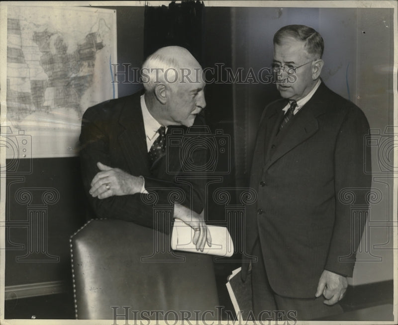 Load image into Gallery viewer, 1937 Press Photo Sec. Ickes &amp; John Fahey Conversing After Conference - neo20872

