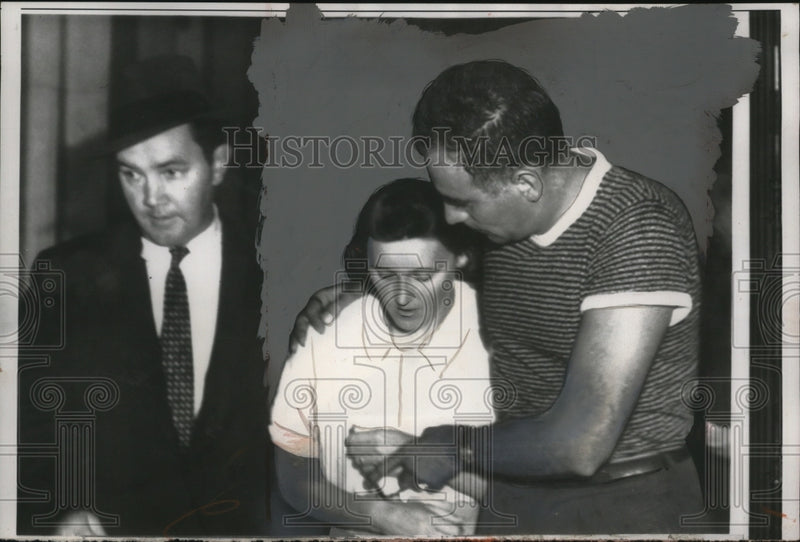 Load image into Gallery viewer, 1956 Press Photo Mrs. Stephen Ruotolo Questioned on Her Six Week Old Baby's Body
