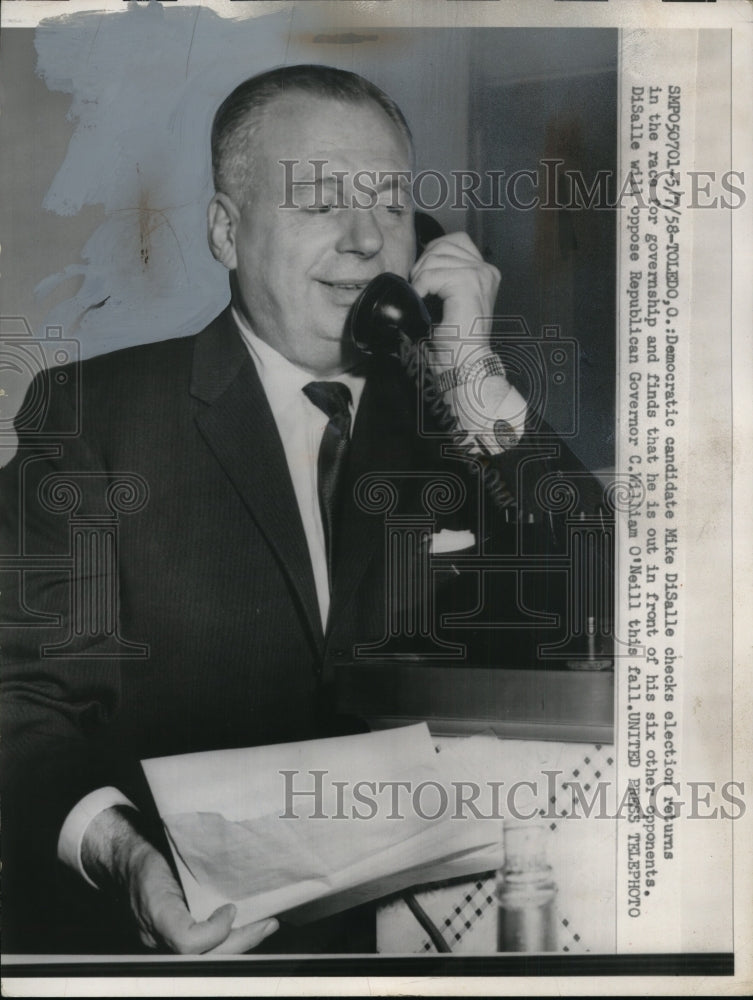 1958 Press Photo Democratic Candidate Mike DiSalle checks election returns