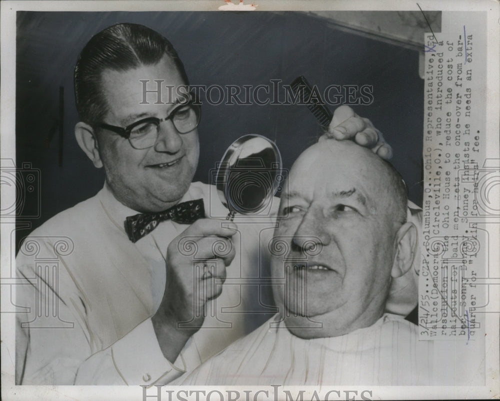 1955 Press Photo Ed Wallace gets a haircut from Barber Sonny Benney - neo22290