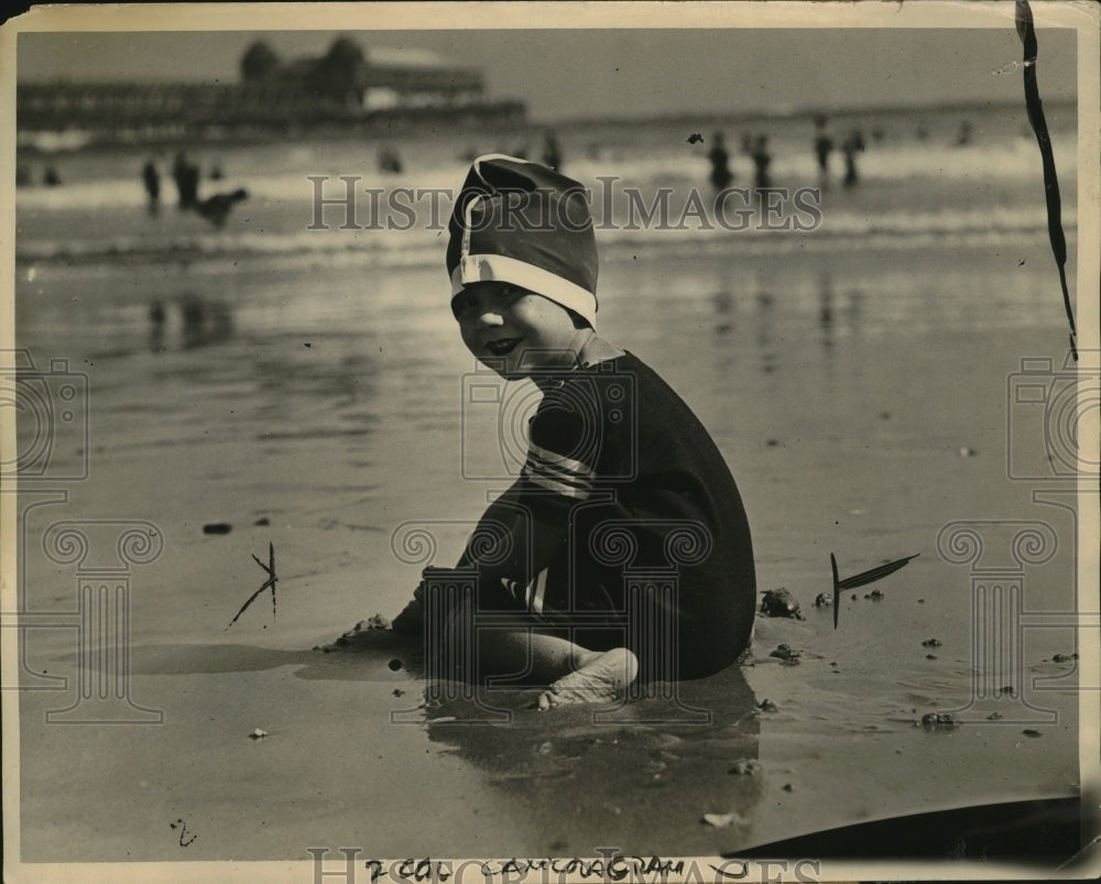 1924 Press Photo Child Plays in sand - neo22417