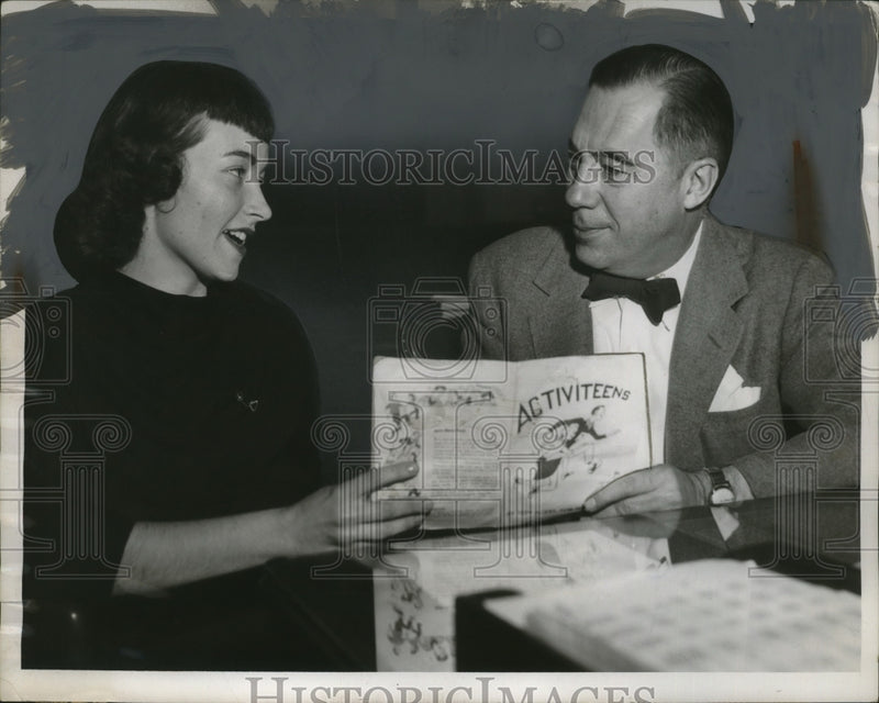 Load image into Gallery viewer, 1955 Press Photo A Booklet for/by Teenagers Examined by Dorothy Woods
