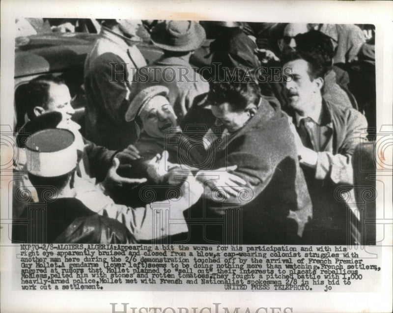 Load image into Gallery viewer, 1956 Press Photo French Premier Guy Mollet arrival in Algeria demonstration
