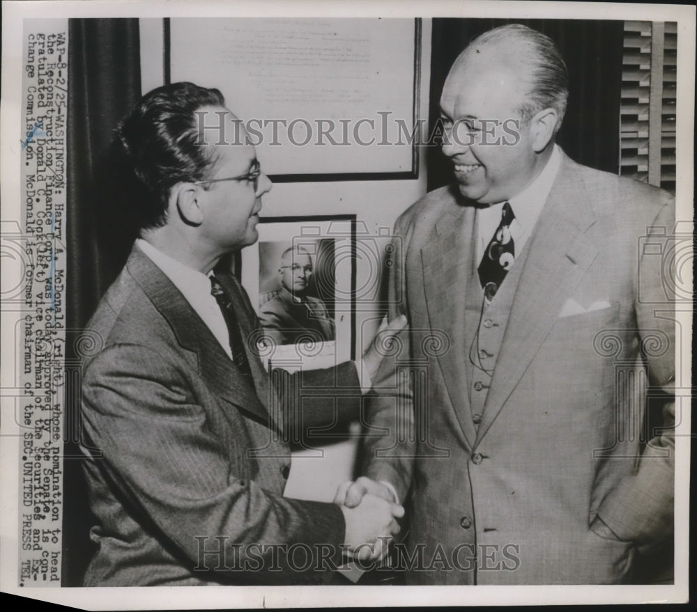 1952 Press Photo Harry A. McDonald Congratulated by Donald C. Cook of SEC